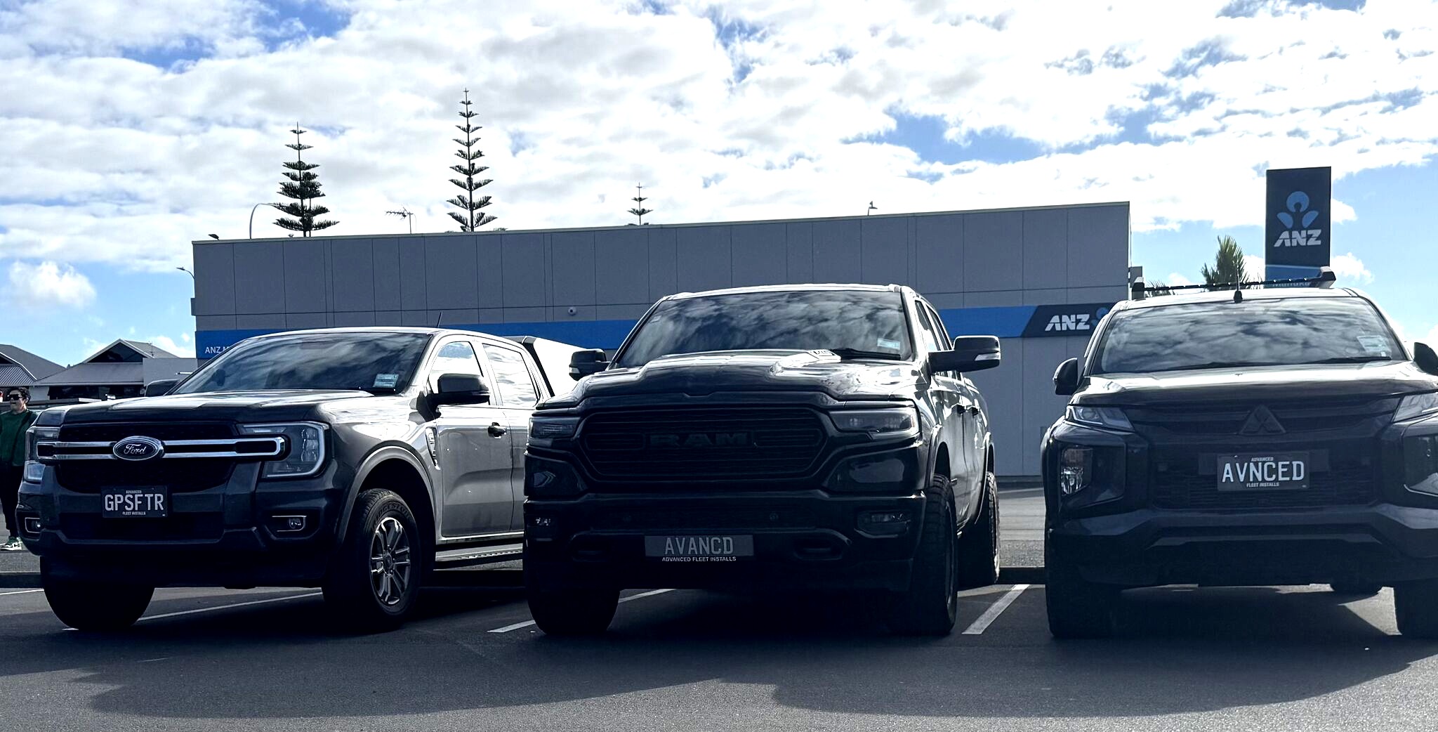 Advanced Fleet Installs crew with company vehicles